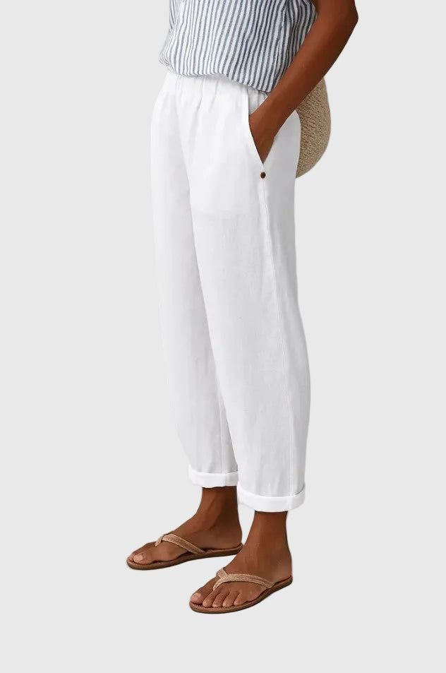 A woman wearing chic comfy pants with a modern relaxed cut and flattering silhouette.