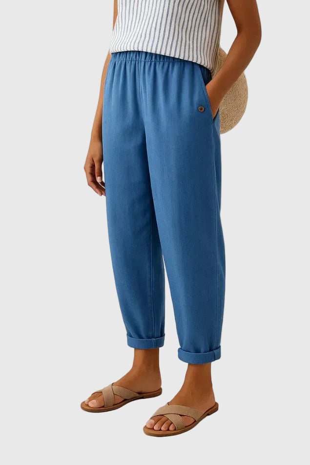 A woman wearing chic comfy pants with a modern relaxed cut and flattering silhouette.