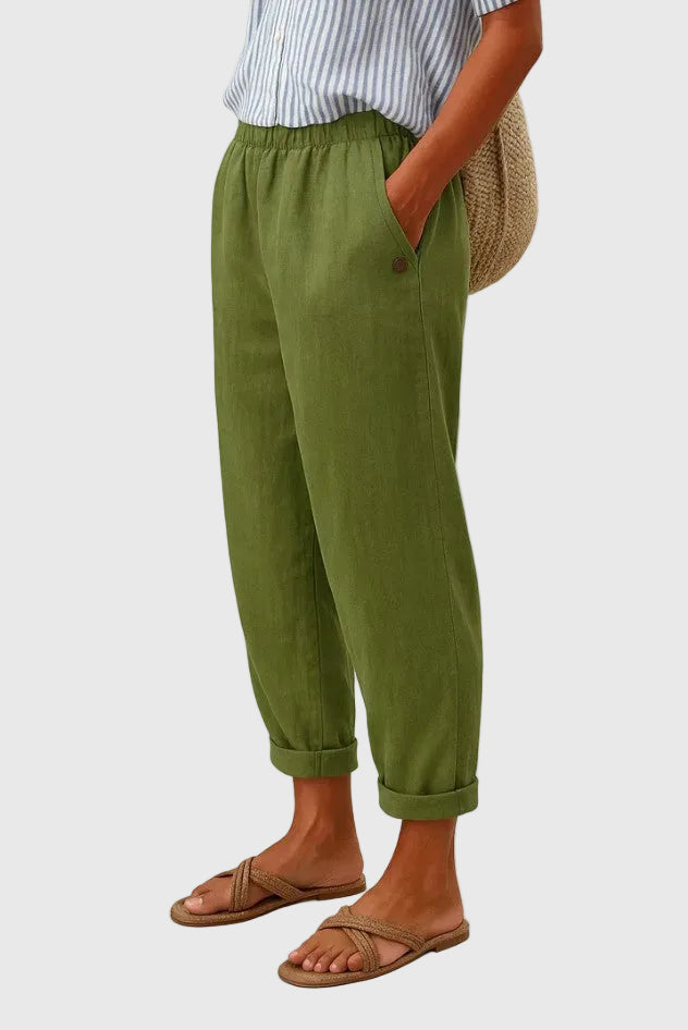 A woman wearing chic comfy pants with a modern relaxed cut and flattering silhouette.