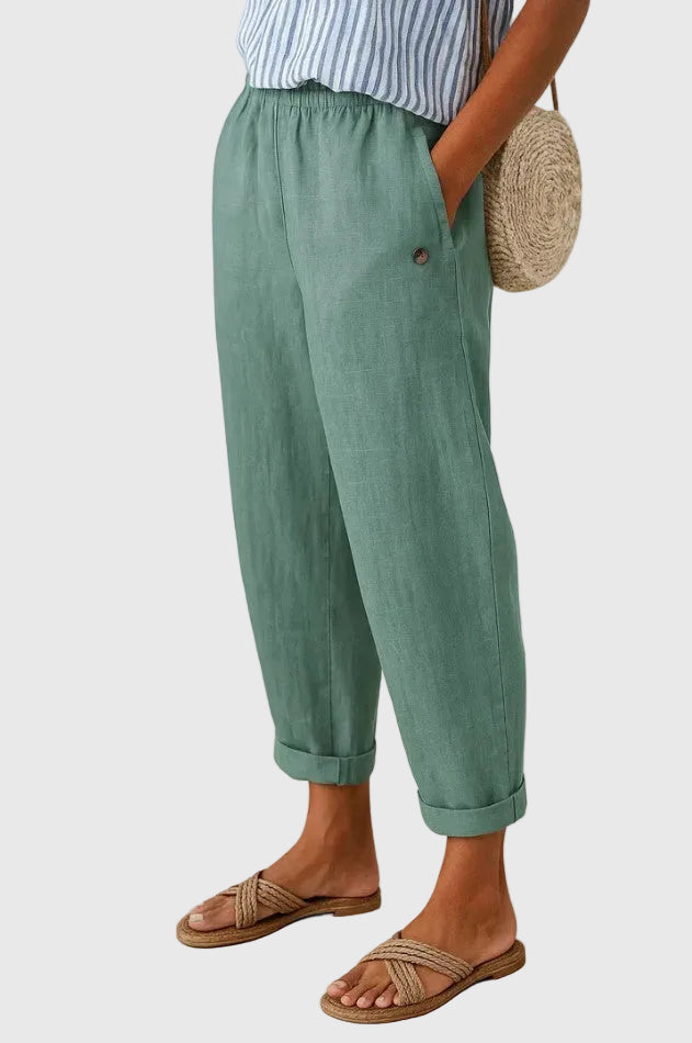 A woman wearing chic comfy pants with a modern relaxed cut and flattering silhouette.