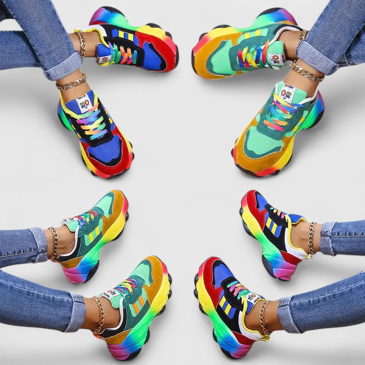 A woman wearing colourful cushioned orthopaedic lace-up shoes