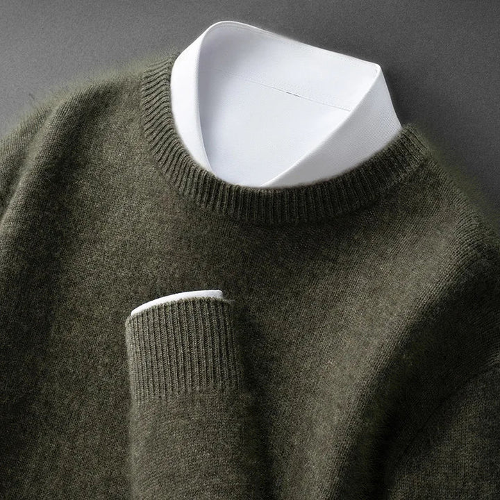 A woman wearing a soft warm sweater layered over a shirt on a cold day.
