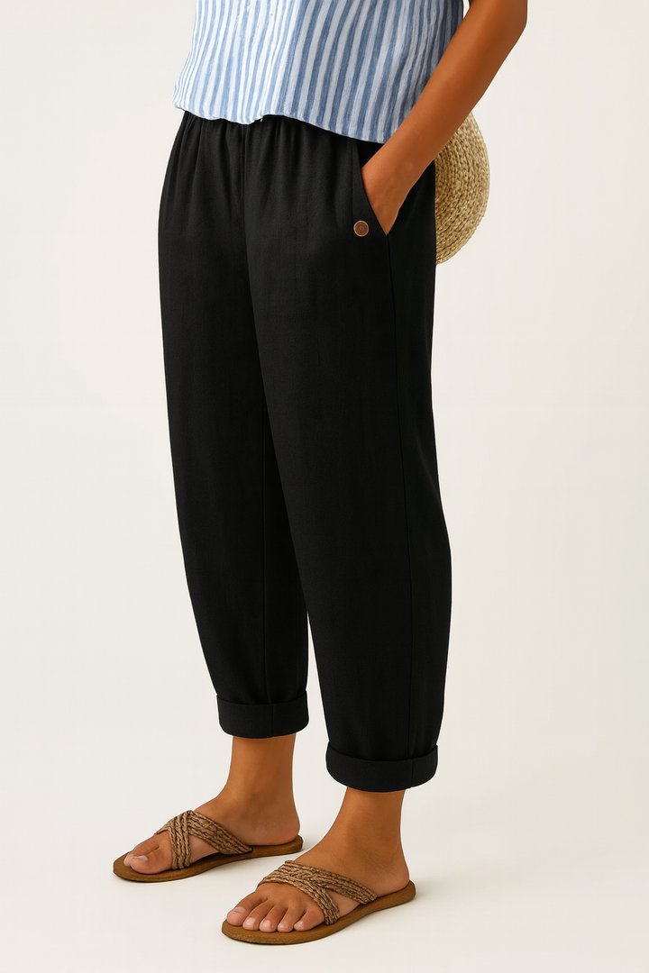 A woman wearing chic comfy pants with a modern relaxed cut and flattering silhouette.