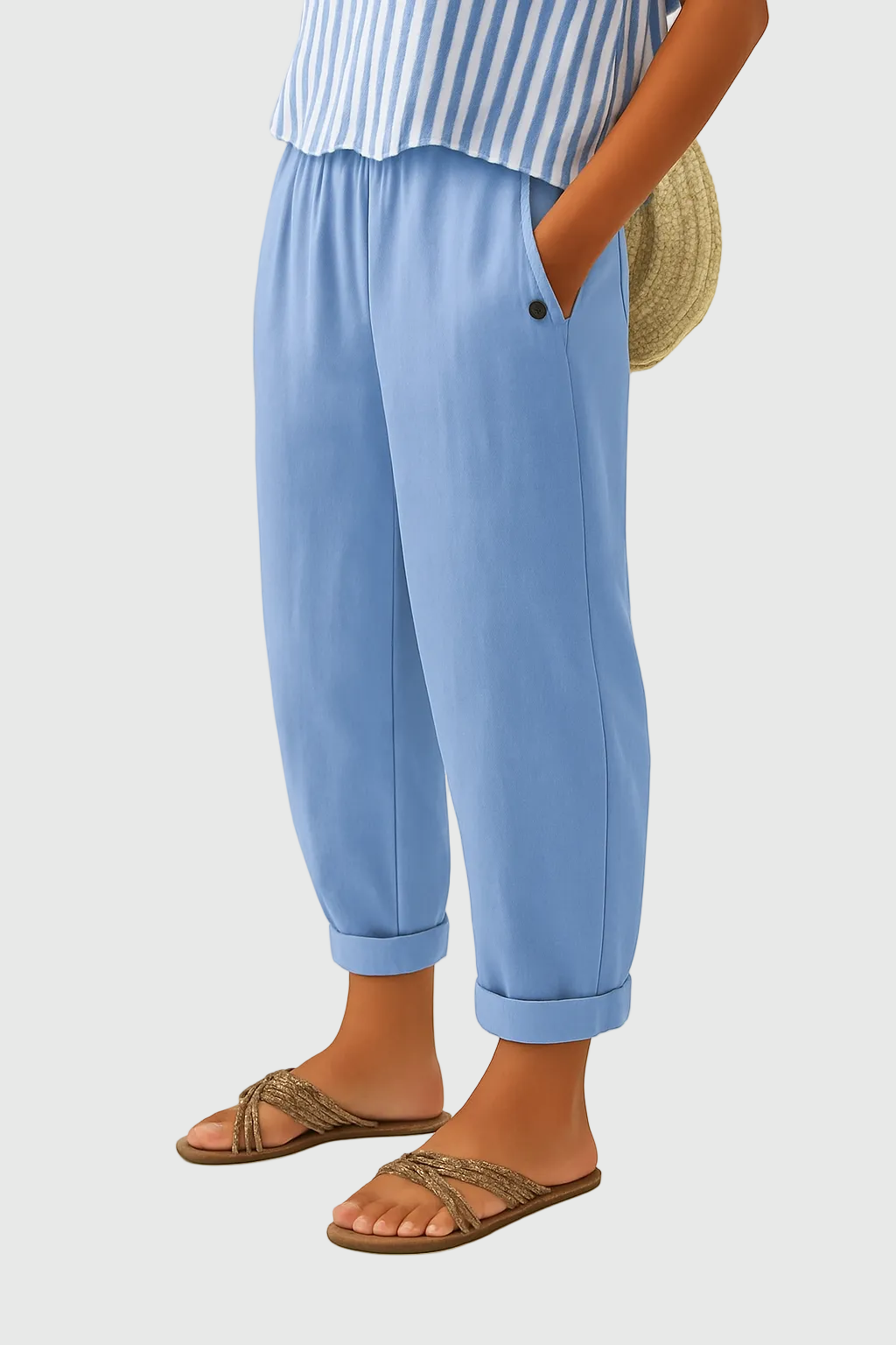 A woman wearing chic comfy pants with a modern relaxed cut and flattering silhouette.