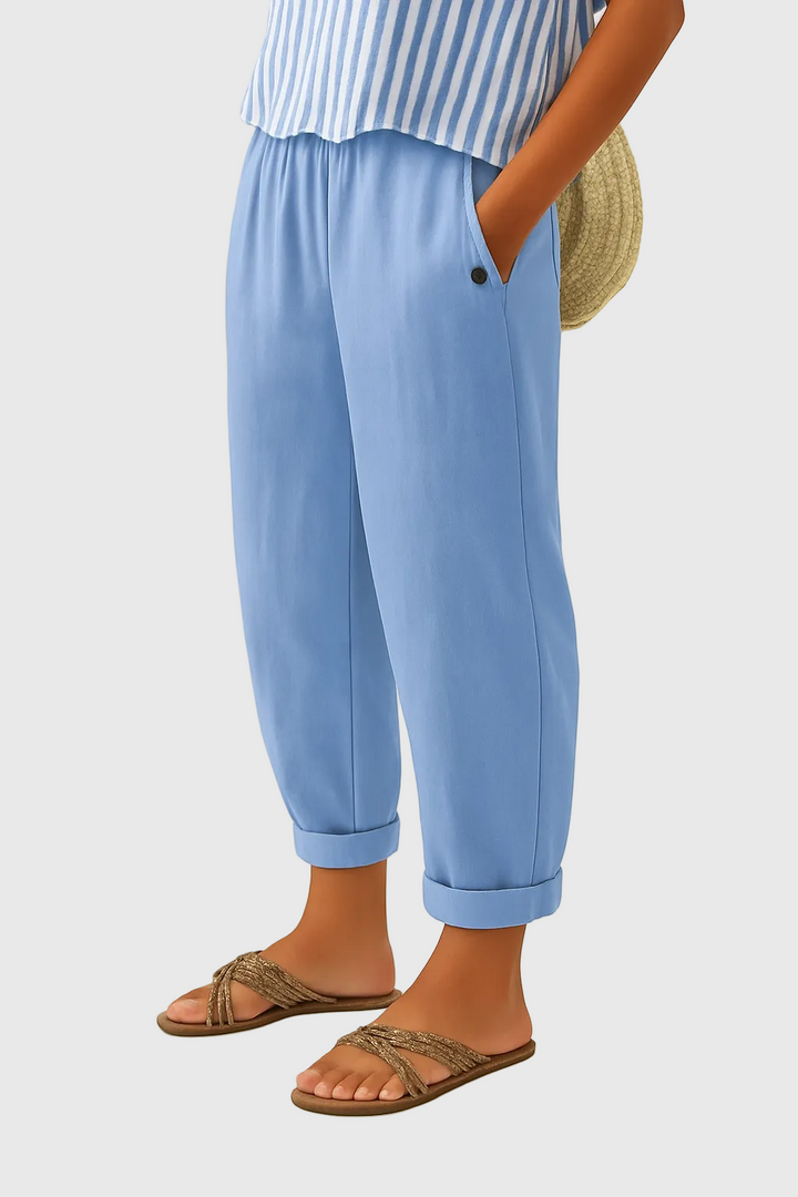 A woman wearing chic comfy pants with a modern relaxed cut and flattering silhouette.