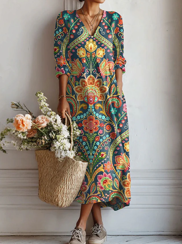 A woman wearing a flowing everyday dress, relaxed and elegant on an ordinary day.