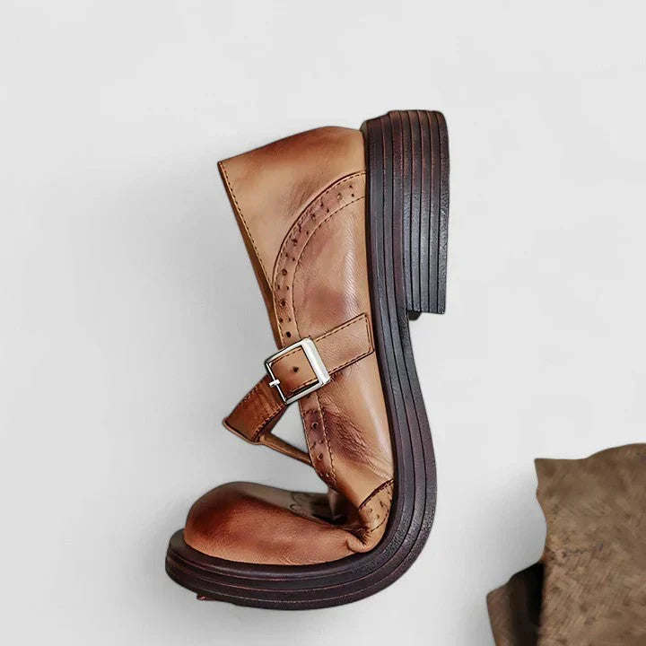 A woman wearing classic strap Mary Jane shoes on an elegant day out.