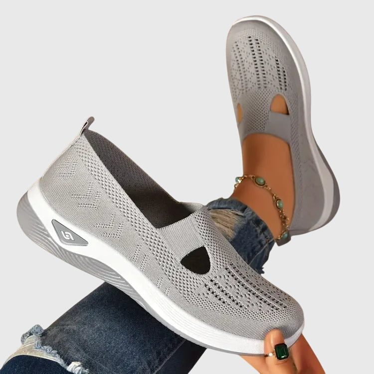 A woman out for a long walk in supportive orthopaedic walking shoes.