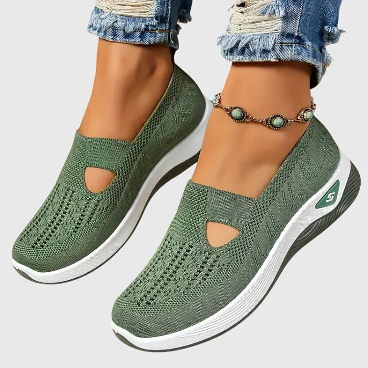 A woman out for a long walk in supportive orthopaedic walking shoes.