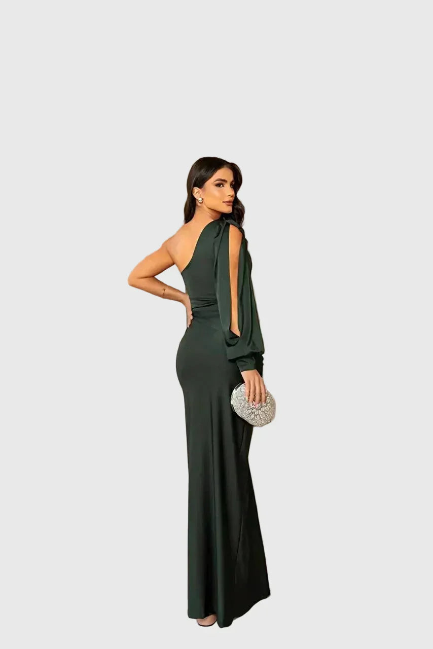 Woman wearing a long flowing evening maxi dress with elegant, graceful lines.