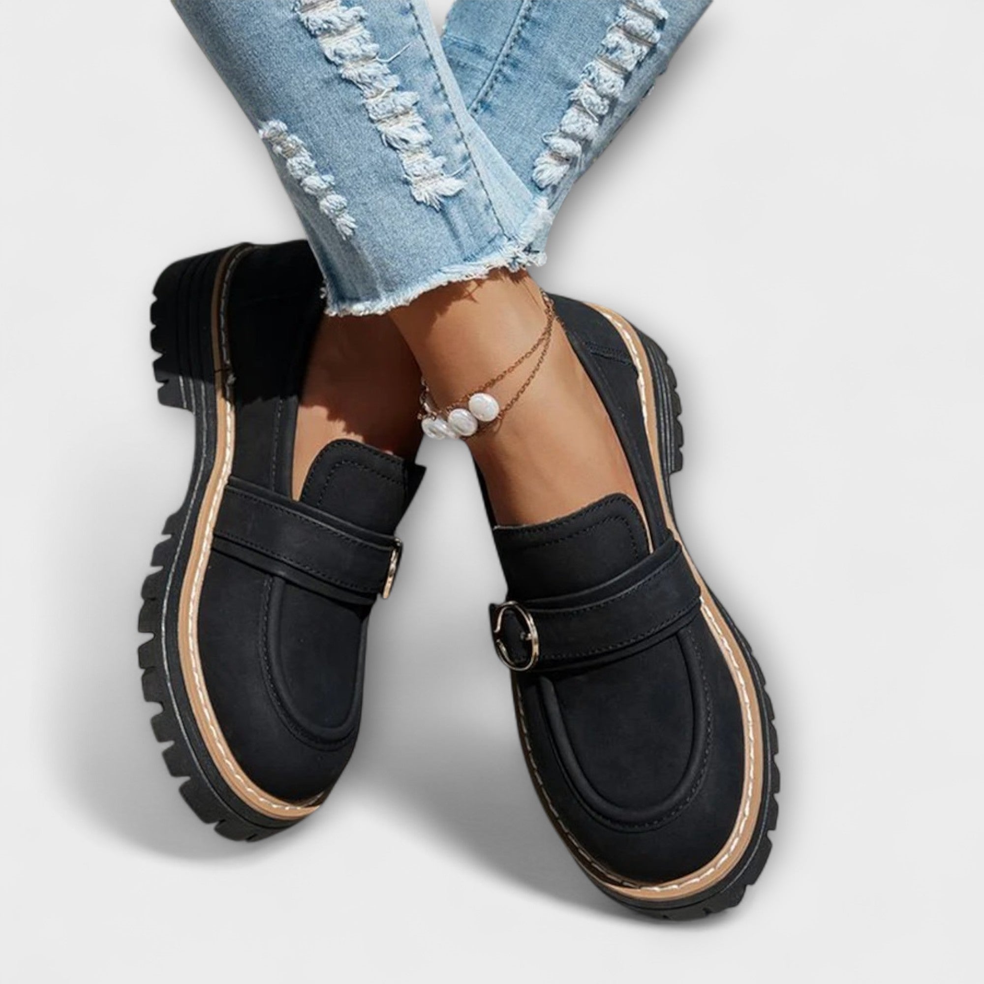 A woman wearing soft round-toe loafers with a casual everyday outfit