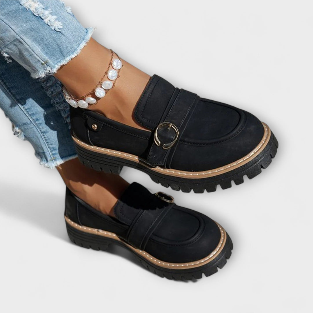 A woman wearing soft round-toe loafers with a casual everyday outfit