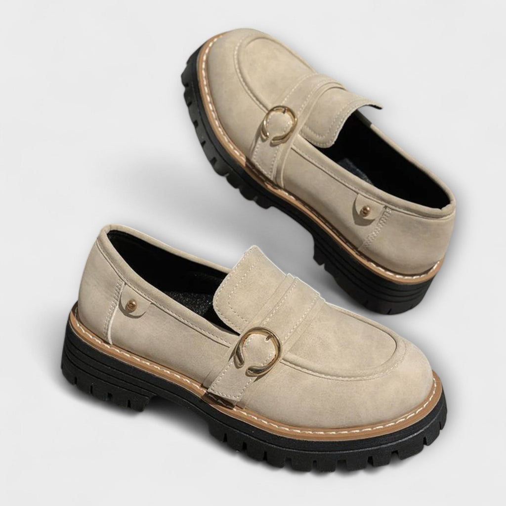 A woman wearing soft round-toe loafers with a casual everyday outfit