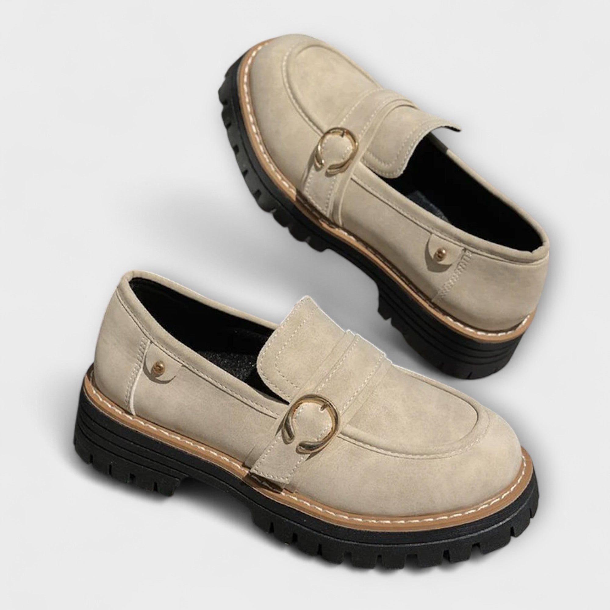 A woman wearing soft round-toe loafers with a casual everyday outfit