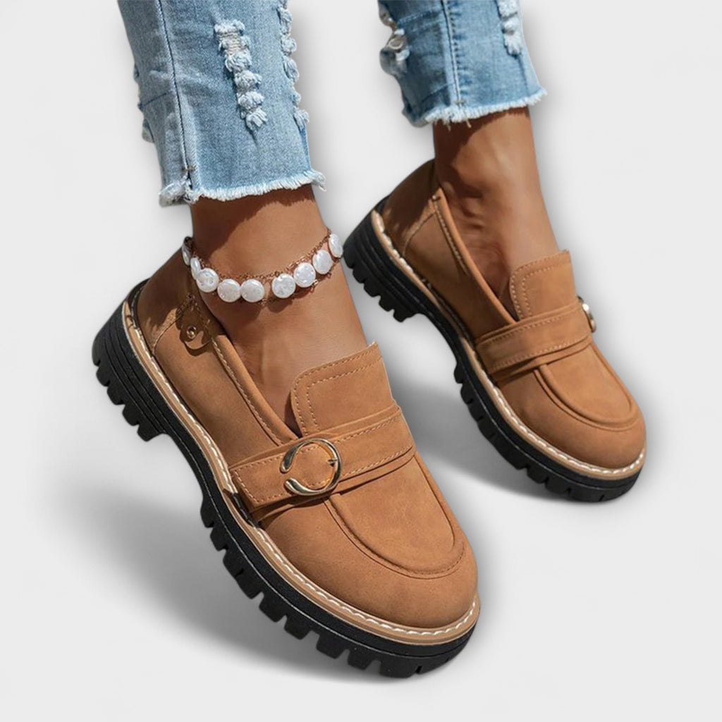 A woman wearing soft round-toe loafers with a casual everyday outfit