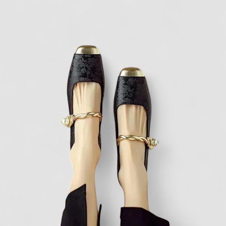 A woman wearing embellished green Mary Jane flats at a special occasion.