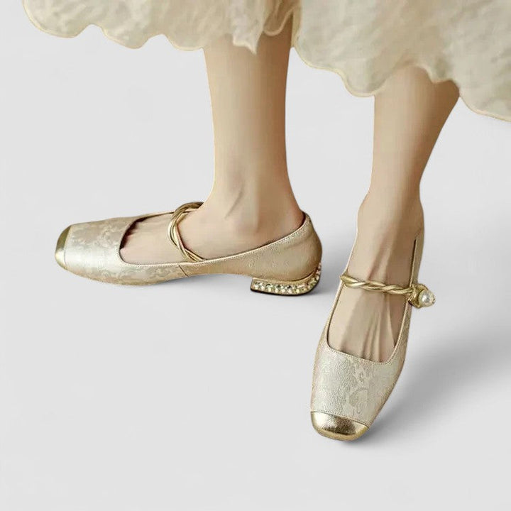 A woman wearing embellished green Mary Jane flats at a special occasion.