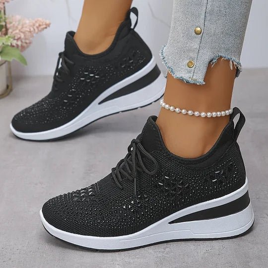 A woman walking comfortably outdoors in supportive everyday shoes.