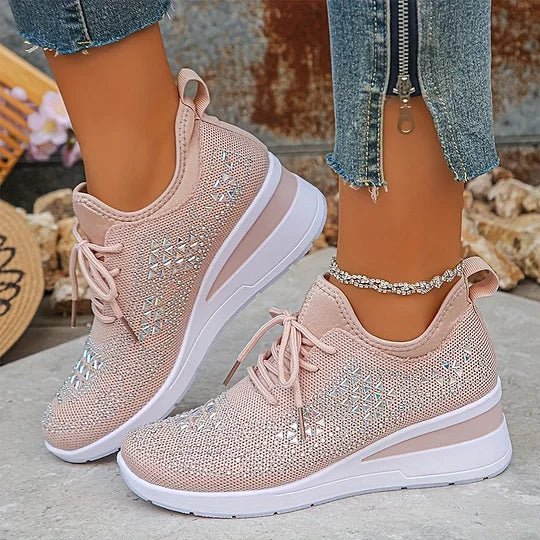 A woman walking comfortably outdoors in supportive everyday shoes.