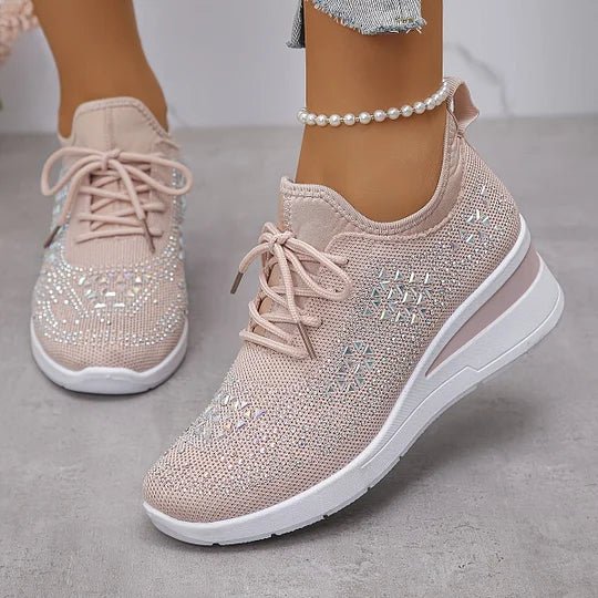 A woman walking comfortably outdoors in supportive everyday shoes.