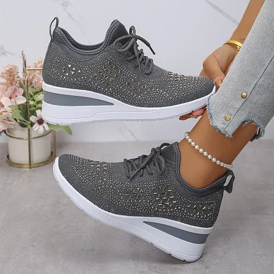 A woman walking comfortably outdoors in supportive everyday shoes.