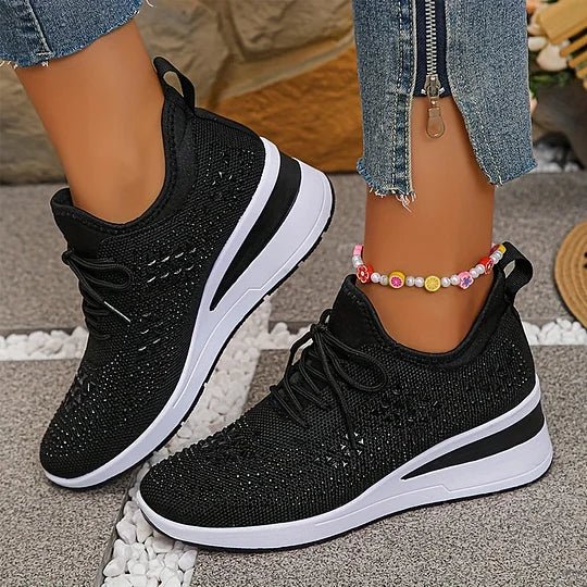 A woman walking comfortably outdoors in supportive everyday shoes.