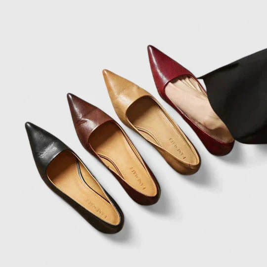 A woman in balanced comfort heels moving from the office to an evening reception.