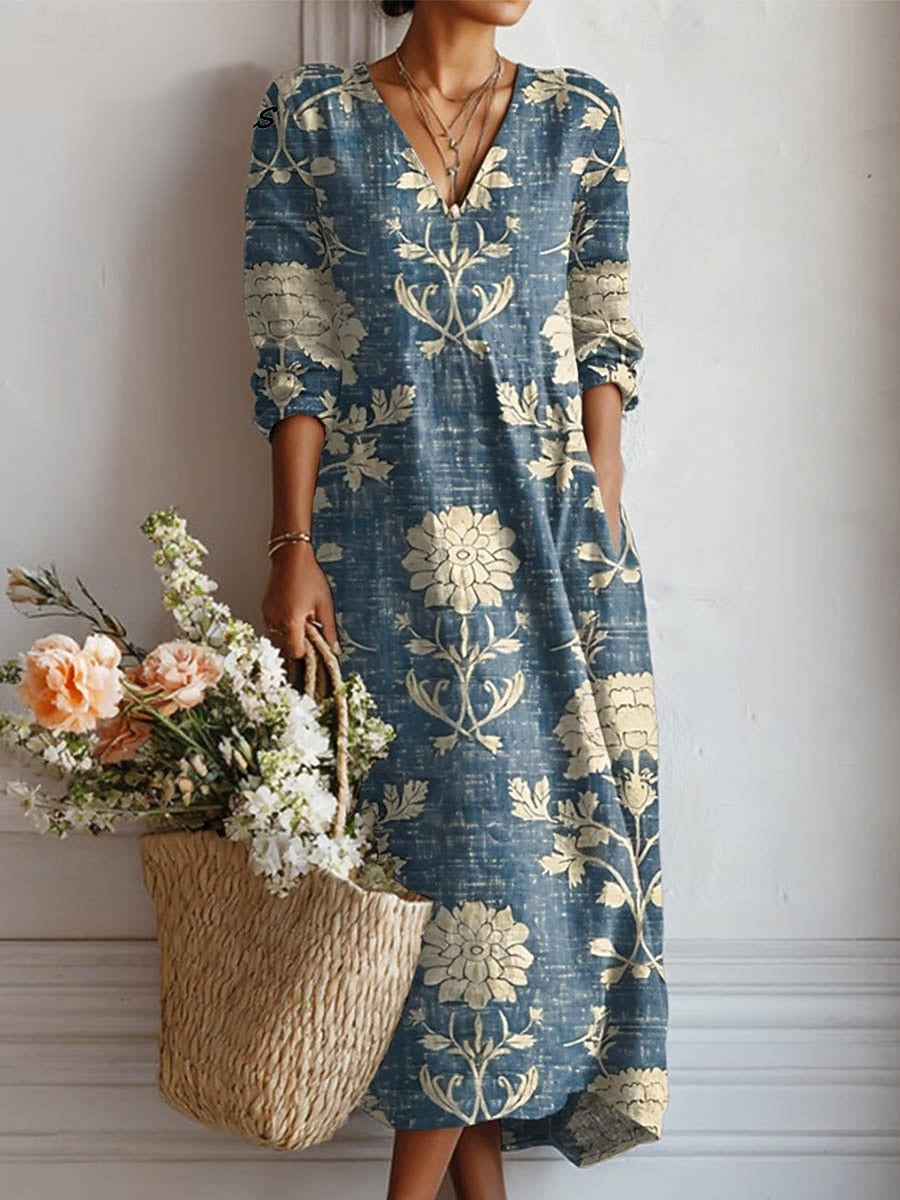 A woman wearing a soft, easy day dress as she strolls through a morning market.
